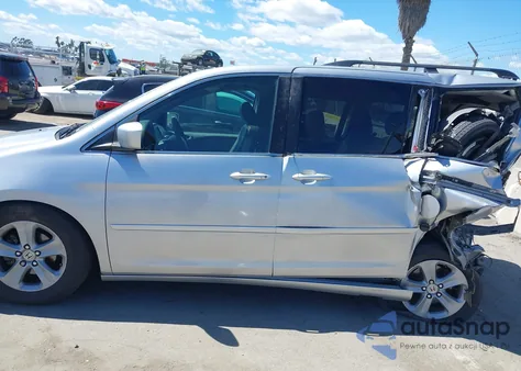 2010 Honda Odyssey Touring from USA, damaged, VIN 5FNRL3H99AB056234